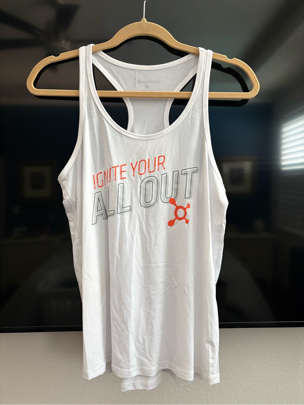 White Racerback Tank Top with Orange Accent - Ignite Your All Out